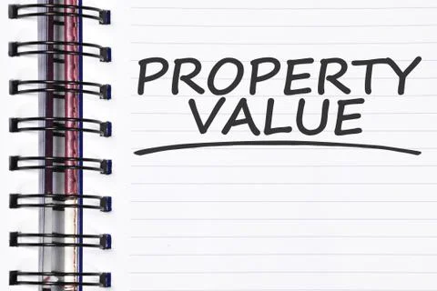 Property value words on spring note book Foto stock