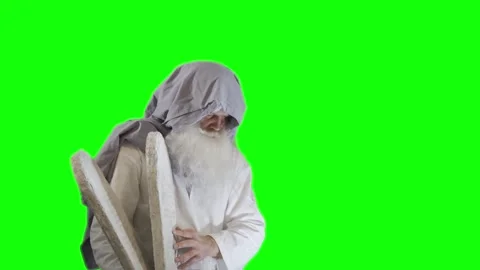 Prophet Moses holds the tablets with the ten commandments on a green Video stock 265250714