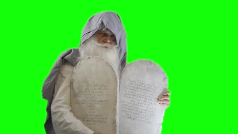 Prophet Moses holds the tablets with the ten commandments on a green Video stock 265250846
