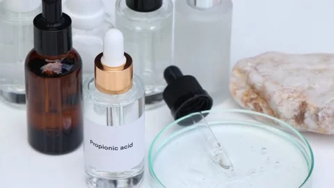 Propionic acid in a bottle, chemical ingredient in beauty produc Stock Footage 223673599