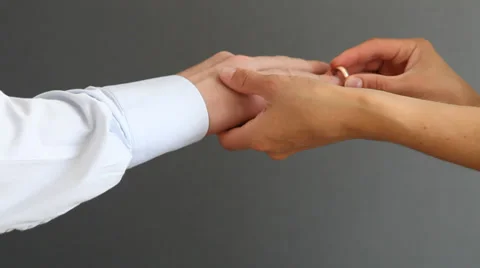 Proposal of marriage - closeup of human hands Stock Footage 30350129