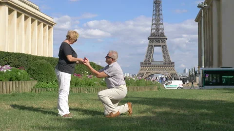 Proposal of marriage in front of Eiffel tower in 4k slow motion 60fps Stock Footage 94882809
