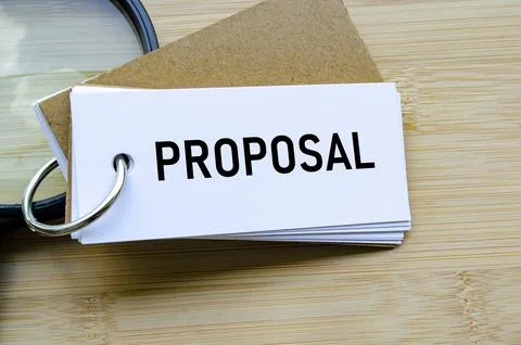 Proposal text on notepad denoting submission of ideas, business bids, or plan Foto stock