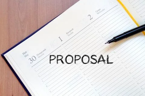 Proposal write on notebook Stock Photos