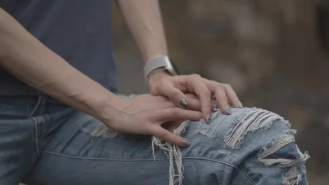 ProRes 4:2:2 log, slow motion footage. Young woman walking in basalt career. Stock Footage 109476232