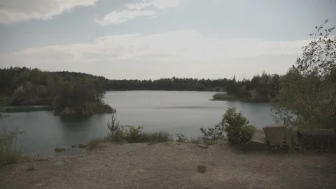 ProRes 4:2:2 log, slow motion footage. Beautiful lake in the wood. Stock Footage 109583301