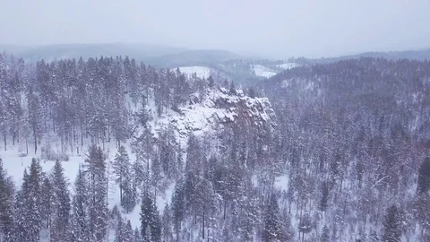 ProRes. Winter forest and rocks from aerial view. Landscape. Stock Footage 84192315