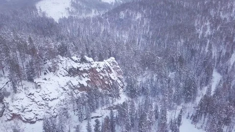 ProRes. Winter forest and rocks from aerial view. Landscape. Stock Footage 84192622