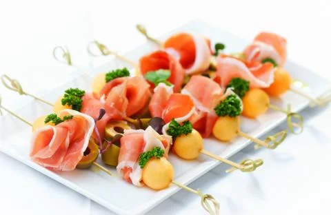 Prosciutto and melon Stock Photos