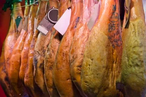 Prosciutto drying in storage Stock Photos