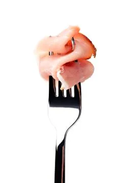 Prosciutto on fork Stock Photos