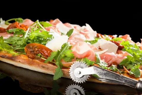 Prosciutto pizza. Stock Photos