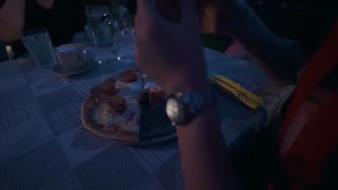 Prosciutto Pizza Shared at Restaurant Table Video stock 337075900