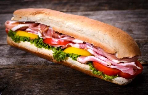 Prosciutto sandwich Stock Photos
