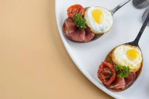 Prosciutto with scrambled eggs Stock Photos