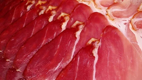 Prosciutto serrano ham cured meat pork dry crudo looping texture pattern closeup Stock-Footage 99012436