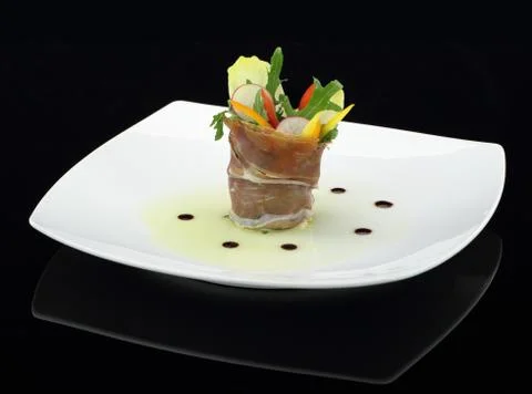 Prosciutto with vegetables salad Stock Photos