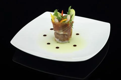 Prosciutto with vegetables salad Stock Photos