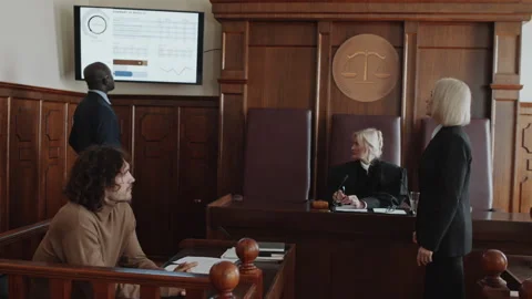 Prosecutor Pointing at Screen and Disagreeing with Attorney at Hearing Stock Footage 281829335