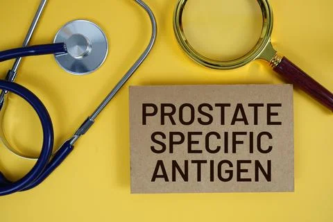 Prostate Specific Antigen (PSA) text on paper card with Stethoscope flat la.. Foto stock