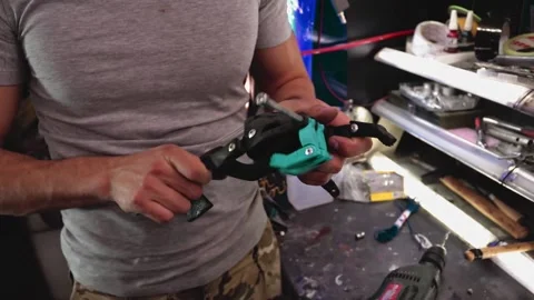 Prosthesis for hands. Assembly of a prosthetic hand in the garage Stock Footage 171884550