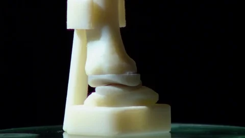 Prosthesis for the metacarpal bone printed in 3D. Smartphone thumb. Stock Footage 81851860