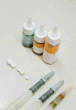 Prosthesis production. teeth prototype construction, painting Stock Photos