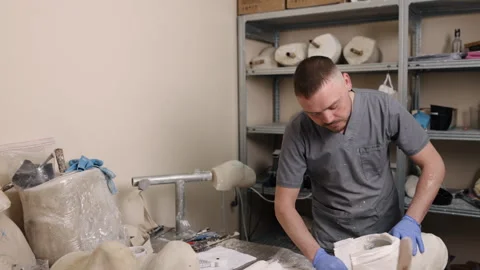 Prosthetic leg, Mold development, Workspace professionalism Stock Footage 243317056
