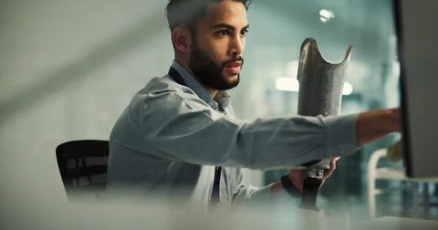Prosthetics, leg or man with computer in office, prototyping process or mod.. Stock Photos