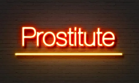 Prostitute neon sign on brick wall background. Stock Illustration