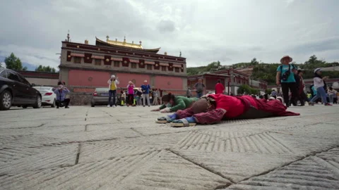 Prostrating Pilgrims at Taer, Jun 22, 2019 Qinghai Xining Stock Footage 320148791