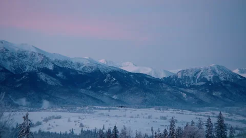 Prosumer drone flying towards beautiful Tatra mountain range before sunrise Stock Footage 255237486