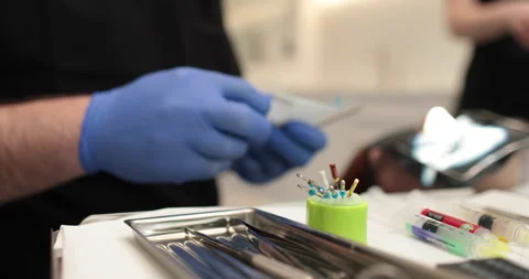 Protaper needles that a nurse prepares for use by a doctor in dentistry. Stock Footage 251572225
