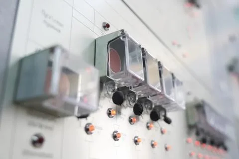 Protected control buttons with caps for compressors and pumps on the gas trea Stock Photos