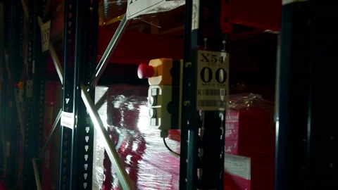 Protected parcels. Creative.Large boxes next to the red security button in the Stockbeeldmateriaal 202287785