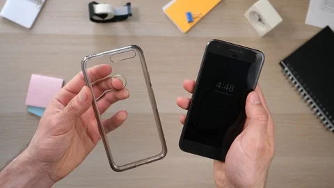 Protecting a Smartphone Using a Mobile Phone Case Stock Footage 90020916
