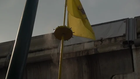 Protection against PM2.5 dust. Automatic yellow color spray machine in Bangkok,  Stock Footage 123603186