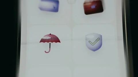 Protection and safety concept represented by red umbrella icon and shield icon Stock Footage 334939414
