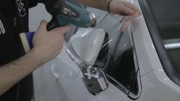 Protection of the car with polypropylene Stock Footage 85902435