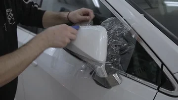 Protection of the car with polypropylene Stock Footage 85903037