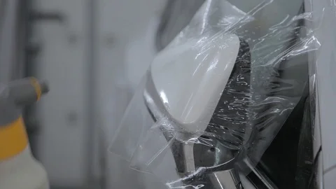 Protection of the car with polypropylene Stock Footage 85903060