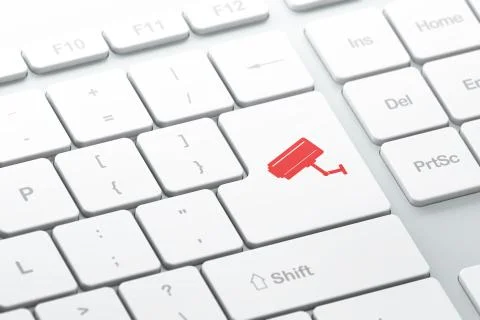 Protection concept: Cctv Camera on computer keyboard background 스톡 일러스트