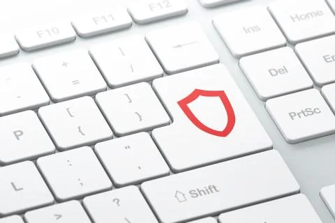 Protection concept: Contoured Shield on computer keyboard backgr イラスト素材