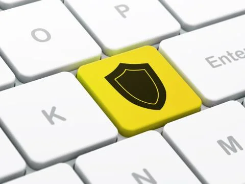 Protection concept: Shield on computer keyboard background Illustrazione stock