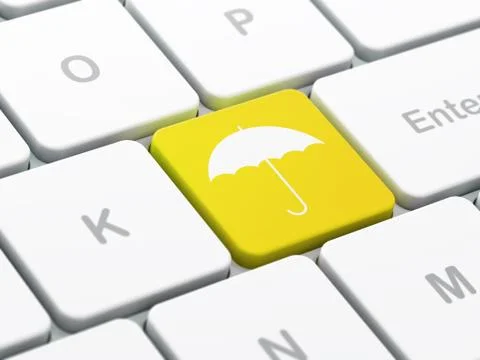Protection concept: Umbrella on computer keyboard background Illustrazione stock