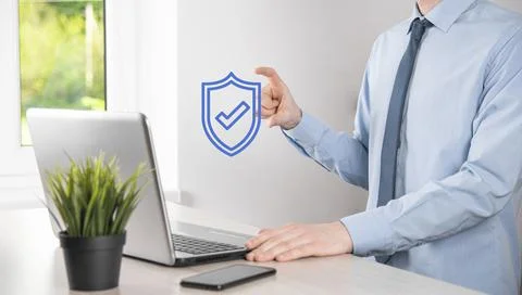 Protection network security computer in the hands of a businessman. business, Stockfoto's