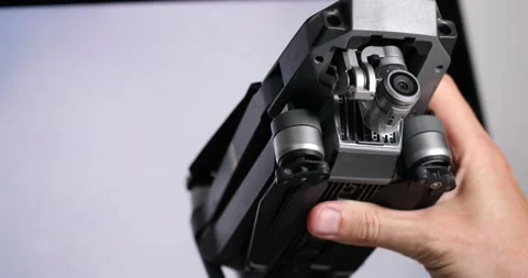 The protective case for the quadcopter camera is opened by the hands of a man Stock Footage 155922719
