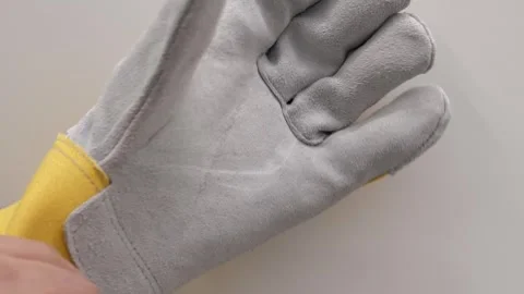 Protective glove for workers_grey Stock Footage 297816905