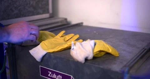 Protective Gloves Drying On Metal Ventilation Duct, Industrial Still Life Stock Footage 340325881
