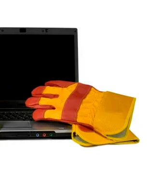 Protective gloves on a laptop isolated. empty black desktop for your text. in Stock Photos